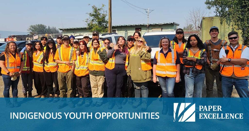 A bunch of Indigenous youth in safety gear