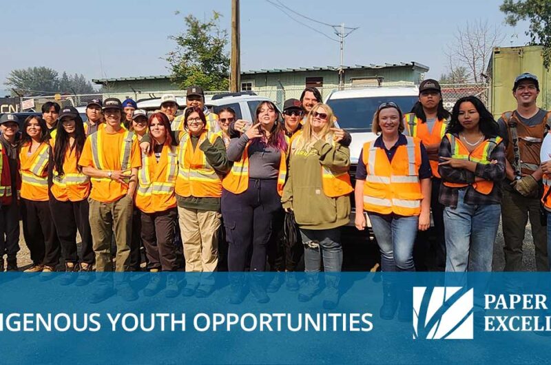 A bunch of Indigenous youth in safety gear